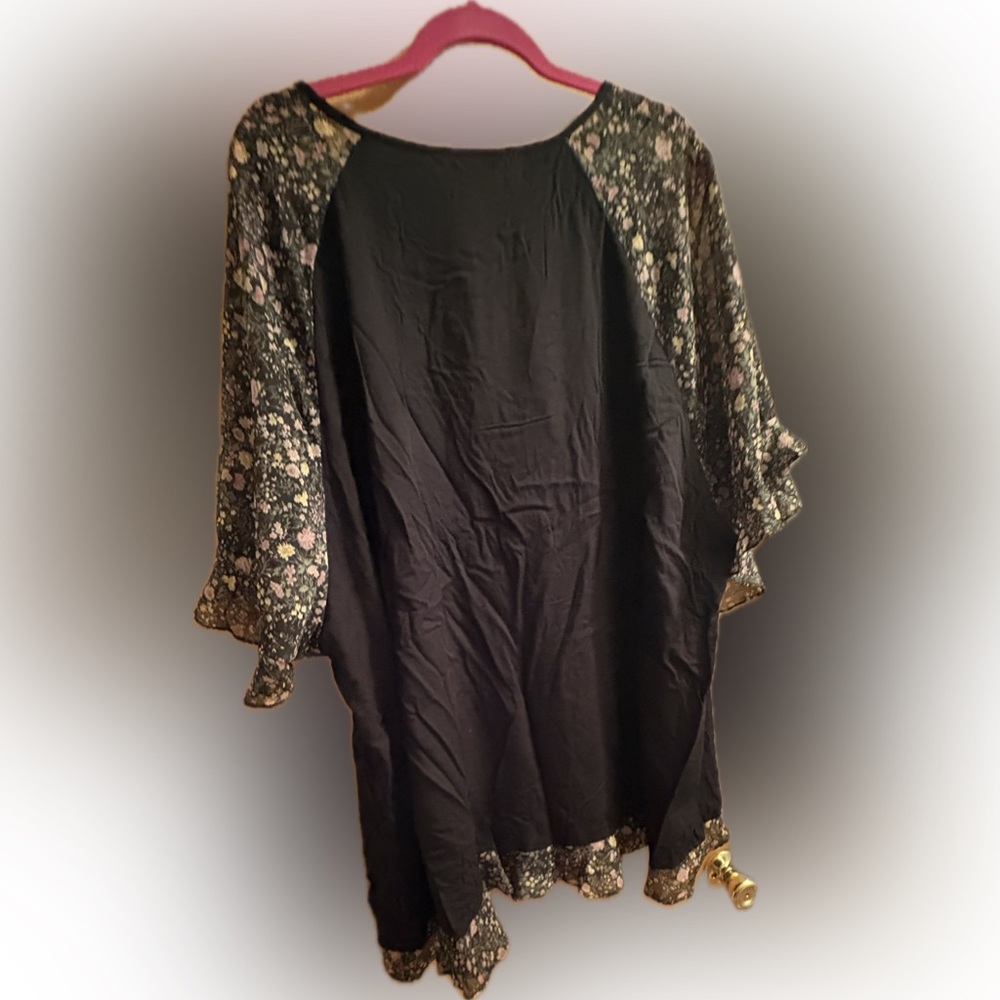 BloomChic Black Top with Floral Accents